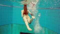 Hairy brunette teen babe Marketa underwater swimming Thumb