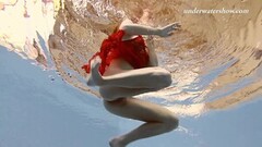 Kinky Ala underwater swims naked Thumb