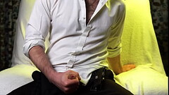A guy with very sexy hands jerks off his small cock and cums loudly on camera. Thumb