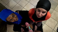 Two Muslim hijab woman on their knees sucking dick and getting their faces covered with cum Thumb