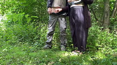 Fingering a fat MILF'_s ass while she jerks off my cock in the park Thumb