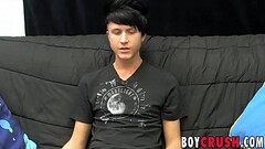 Young gay man jerks off his giant dick during an interview Thumb